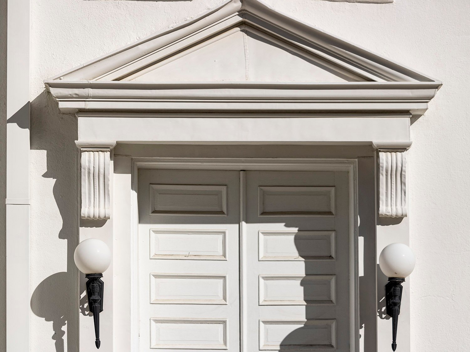 Door and pediment on the facade of First Methodist Church, Opelika, Alabama