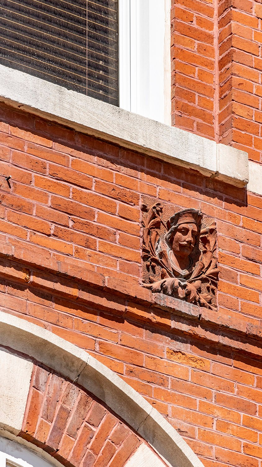 Terracotta ornamental figure on the facade of Samford Hall, Auburn, Alabama