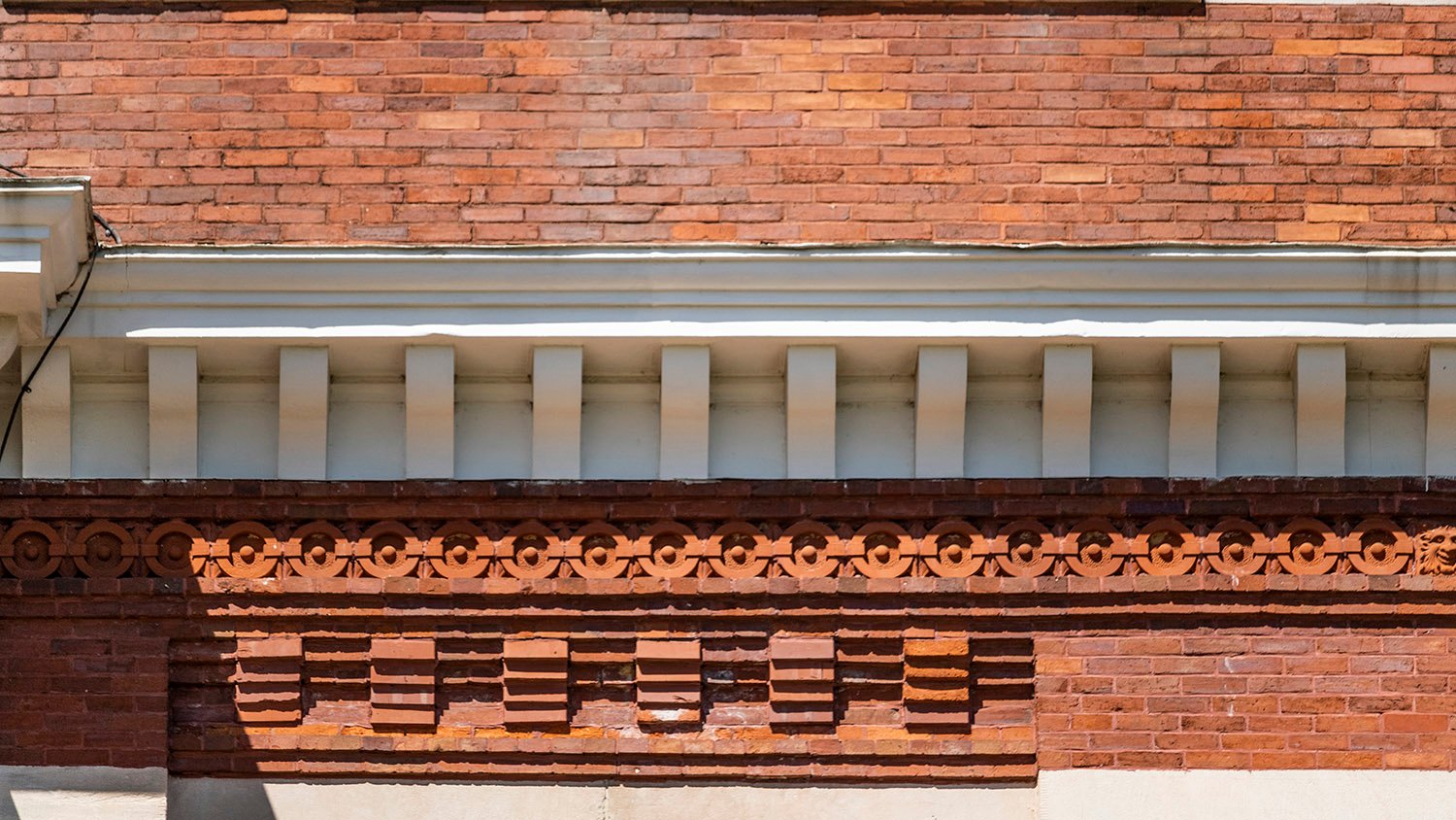 Cornice and terracotta frieze on the facade of Samford Hall, Auburn, Alabama