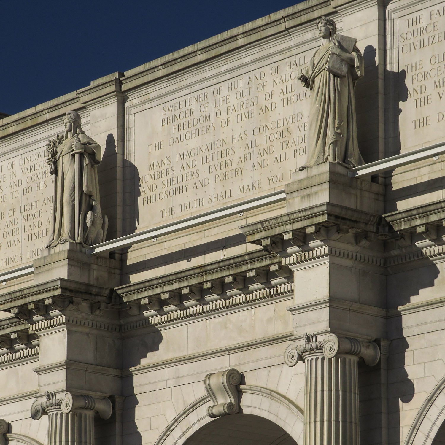 Statuary and inscripted frieze on the south facade of Washington Union Station