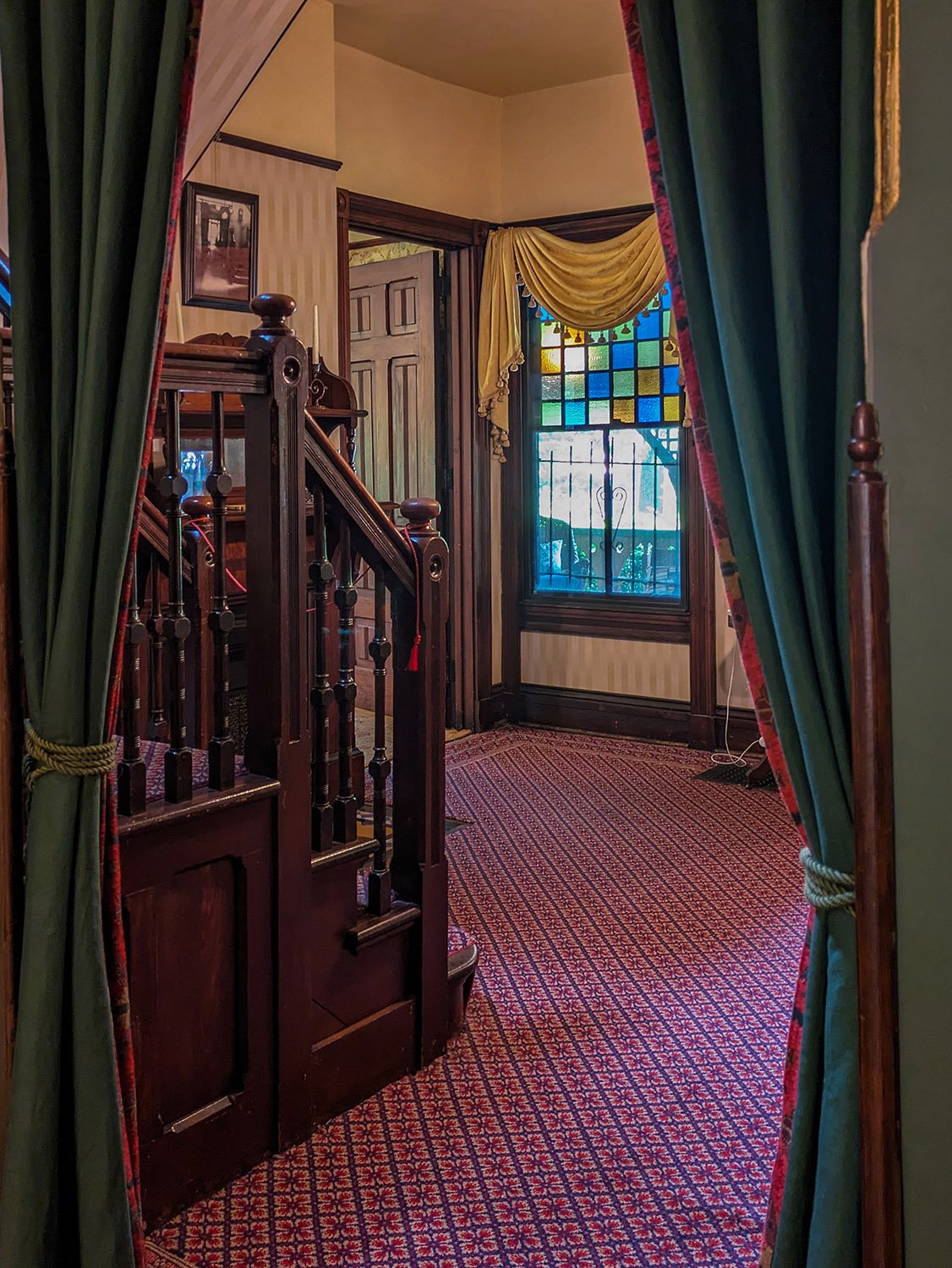 Looking toward the stairs and stair hall in The Wren's Nest, Atlanta