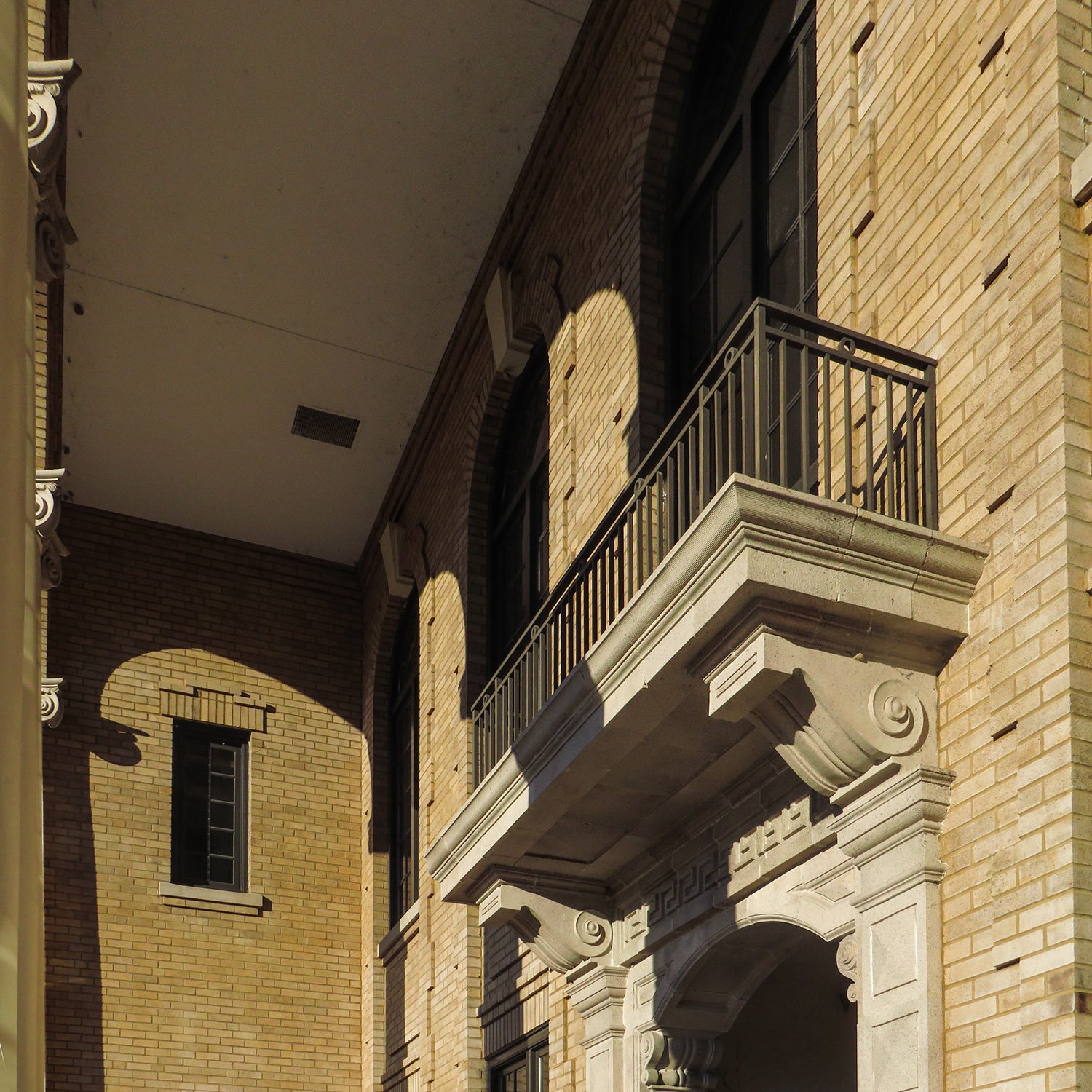 Looking up at the pediment and balcony above the main entrance of the Sumter County Courthouse, Bushnell, Florida