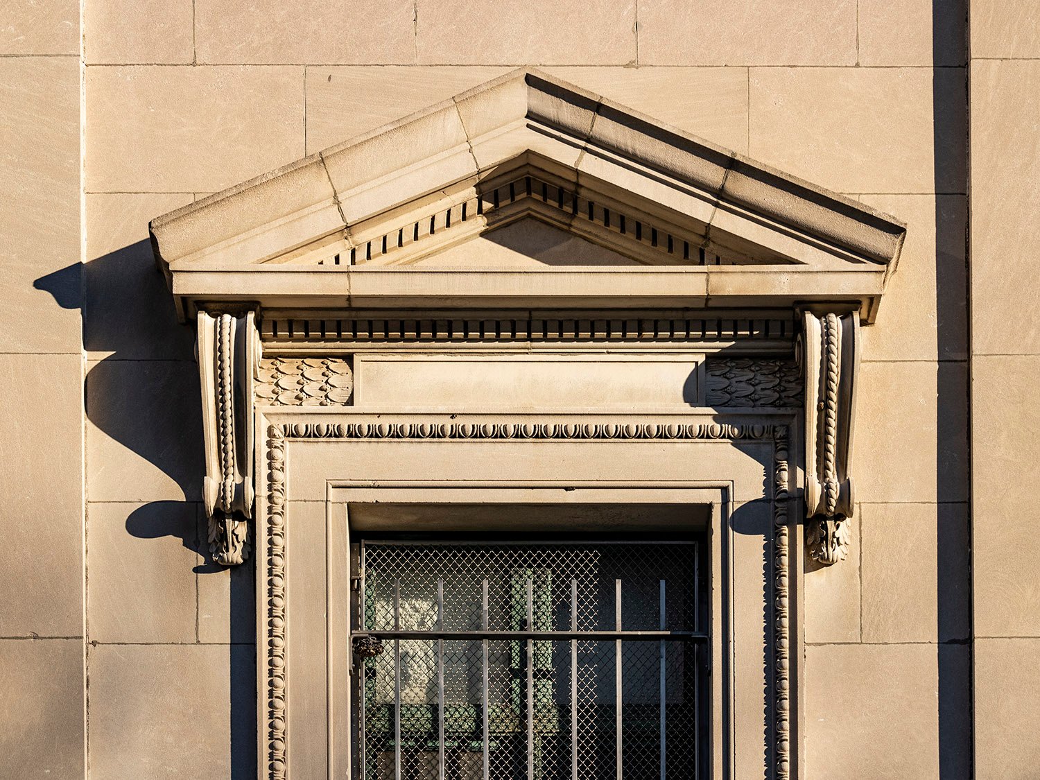 Pedimented window on the facade of the Cooper Branch Free Public Library, Camden, New Jersey 