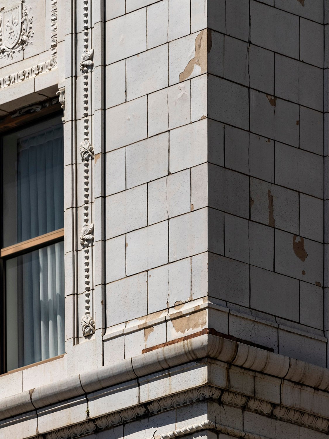 Window, cornice, and terracotta cladding on the southeast corner of the Empire Building, Birmingham, Alabama
