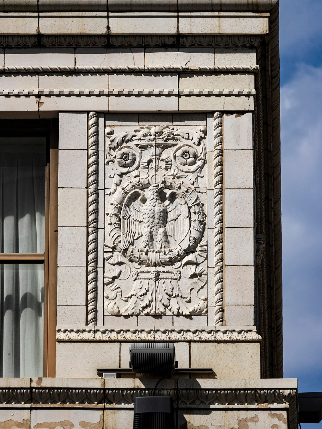 Terracotta ornamental panel on the third floor of the Empire Building, Birmingham, Alabama