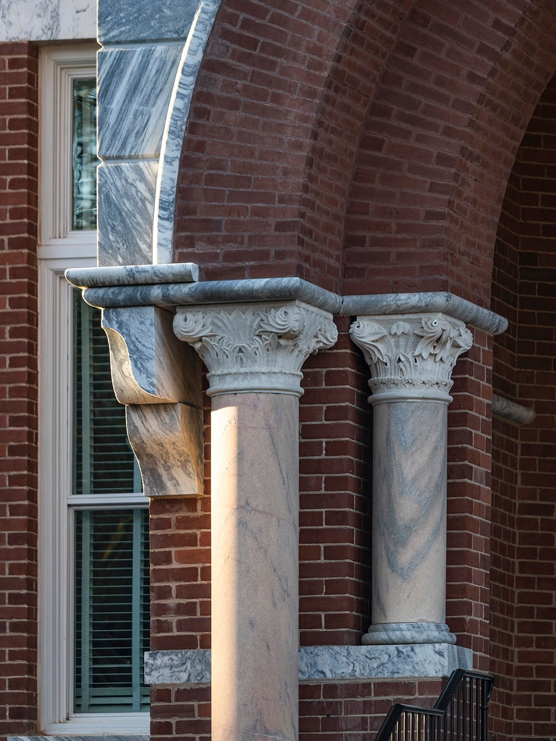Columns, capitals, conrbels, and marble trim at the entrance of Agnes Scott Hall, Decatur, Georgia