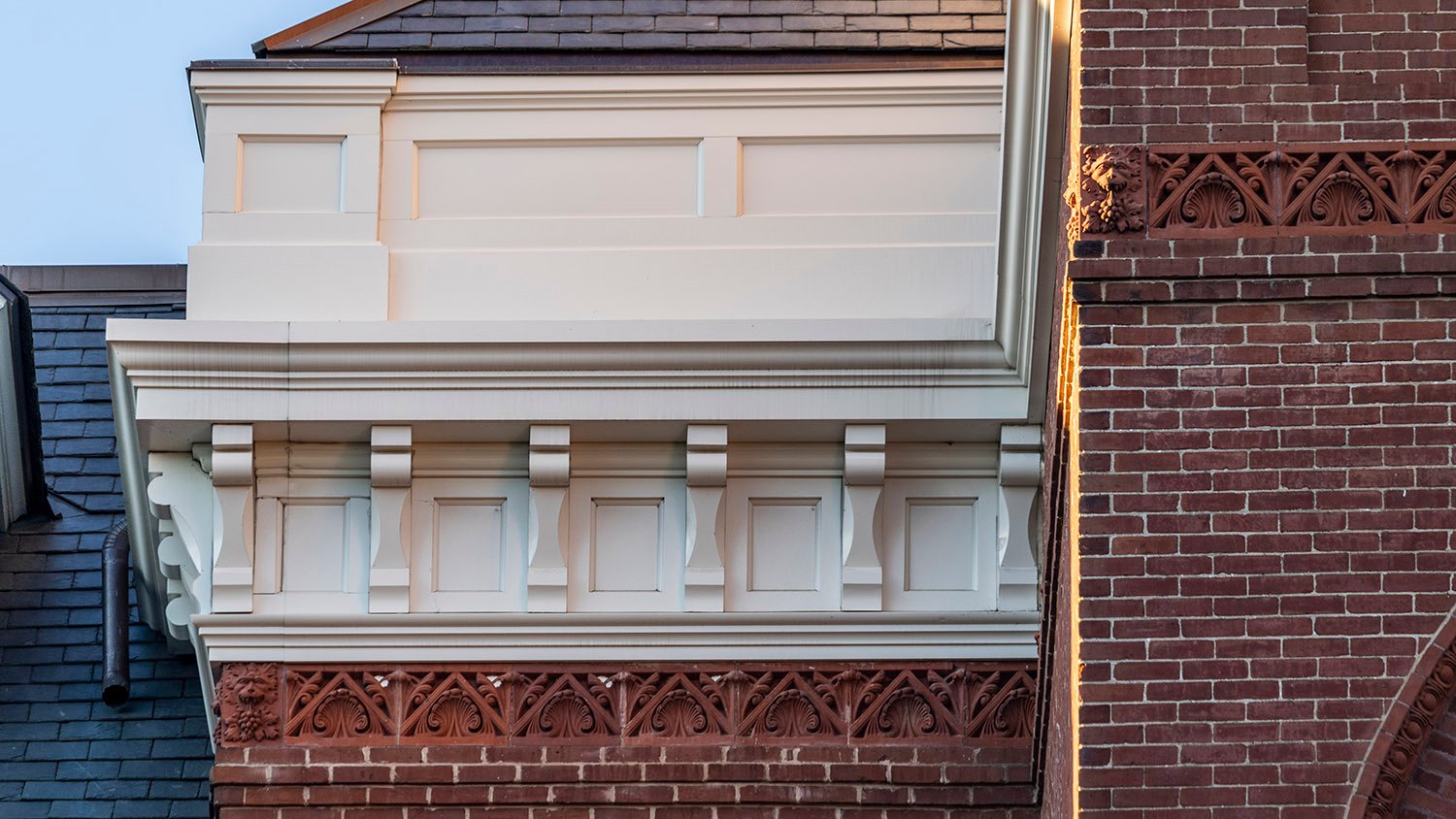 Parapet, eaves, brackets, and terracotta stringcourses on the facade of Agnes Scott Hall, Decatur, Georgia