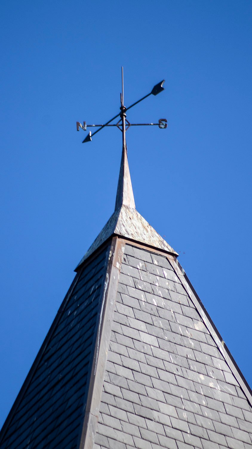 Weather vane and shingles on the tower of Agnes Scott Hall, Decatur, Georgia