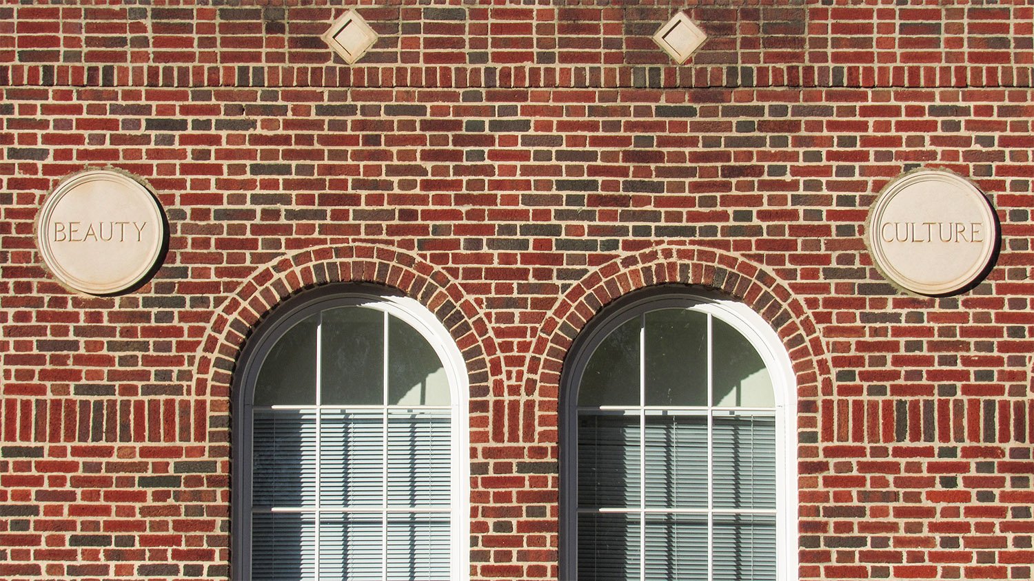 First-floor windows and ornamentation on the facade of Joseph E. Brown Junior High School, Atlanta
