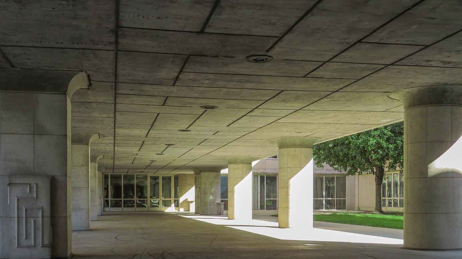 Beneath the connecting bridge of First Christian Church, looking toward the east wing