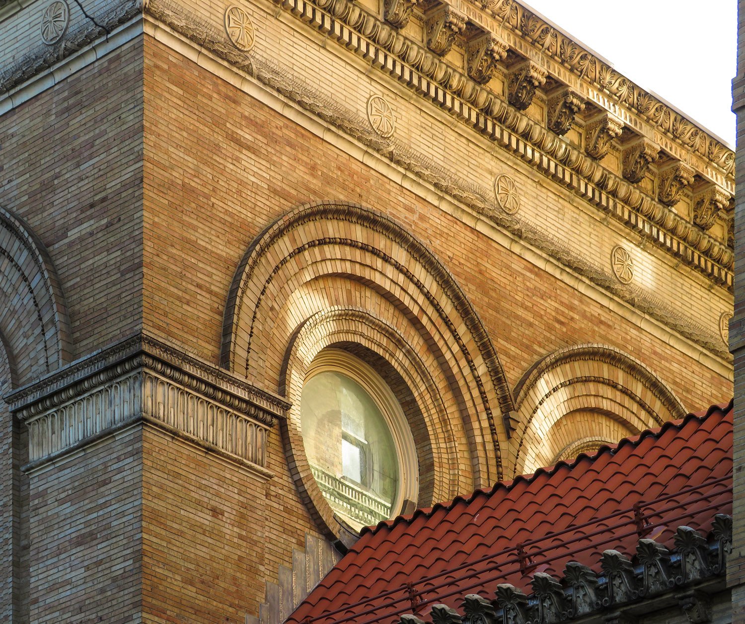 Round windows on the west elevation of Judson Memorial Church, New York
