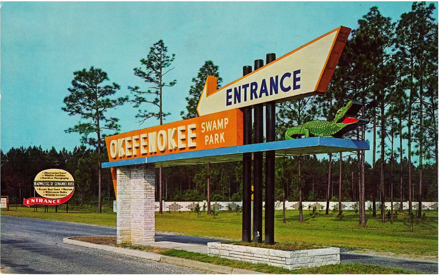 Okefenokee Swamp Park entrance sign. Photograph by Gene Aiken from an undated postcard.