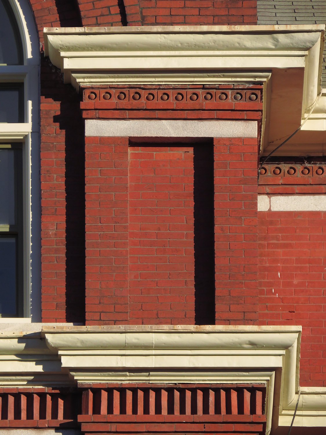 Cornices, spandrel, and terracotta stringcourses on the facade of the Academic Building at Georgia Tech, Atlanta