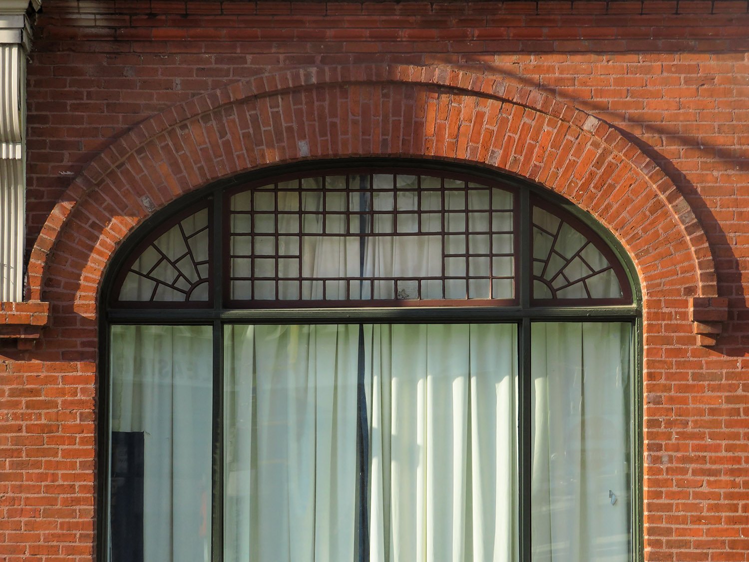 Former ground-floor shop entrance on the facade of 125 Edgewood Avenue, Atlanta