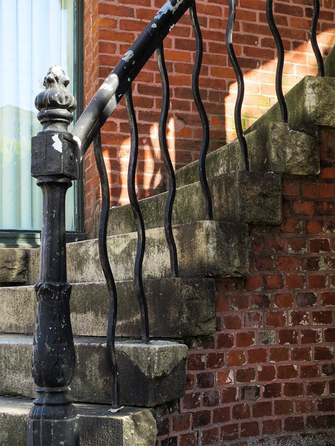 Winding stairs to the porch on the west elevation of 125 Edgewood Avenue, Atlanta