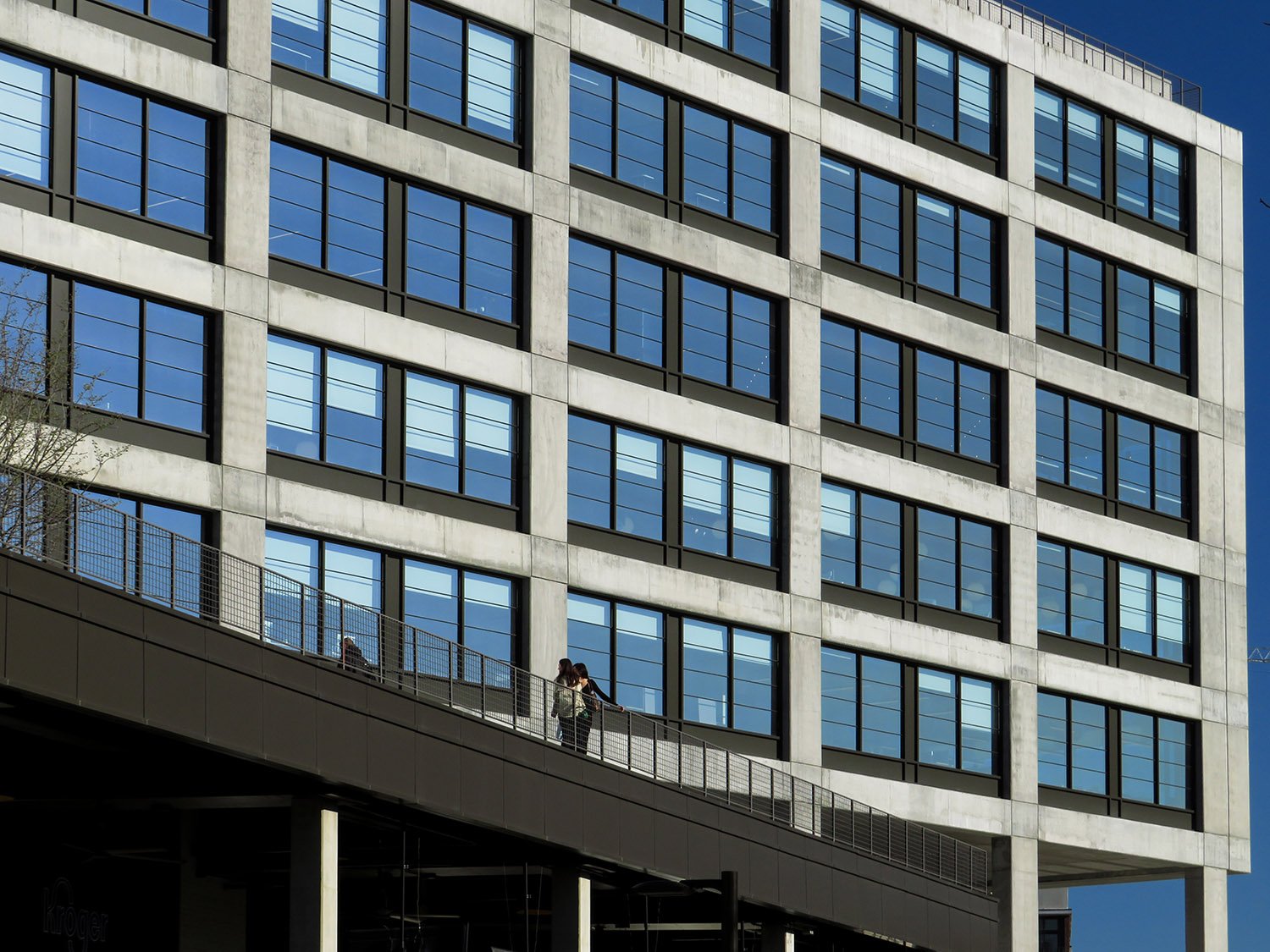 Looking up at the west facade of 725 Ponce