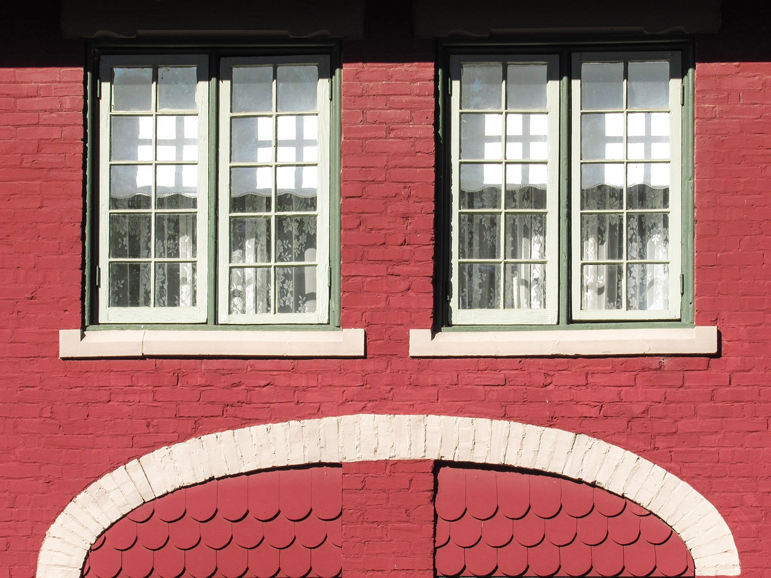 Second-floor windows on the Anniston Inn kitchen and dining hall