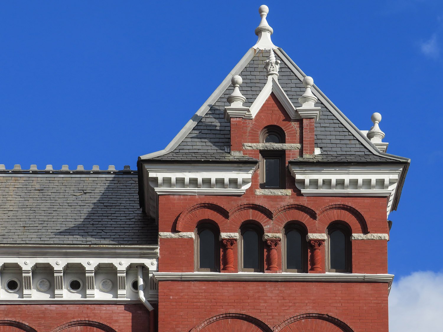 Attic windows and gable dormer on the facade of the New Hanover County Courthouse, Wilmington, North Carolina
