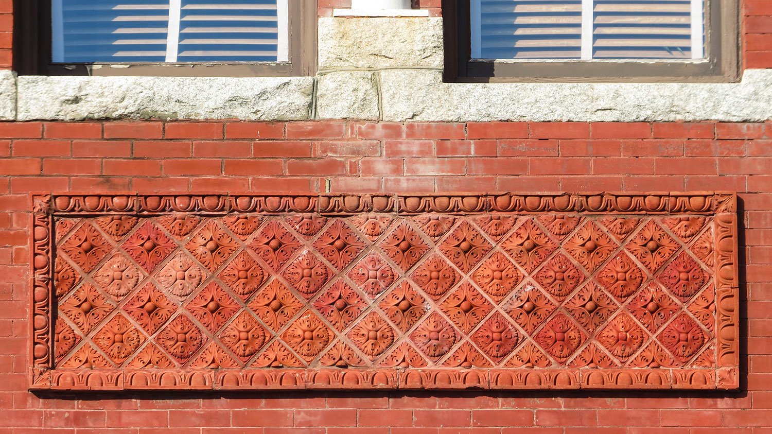 Terracotta spandrel between the first- and second-floor windows on the New Hanover County Courthouse, Wilmington, North Carolina