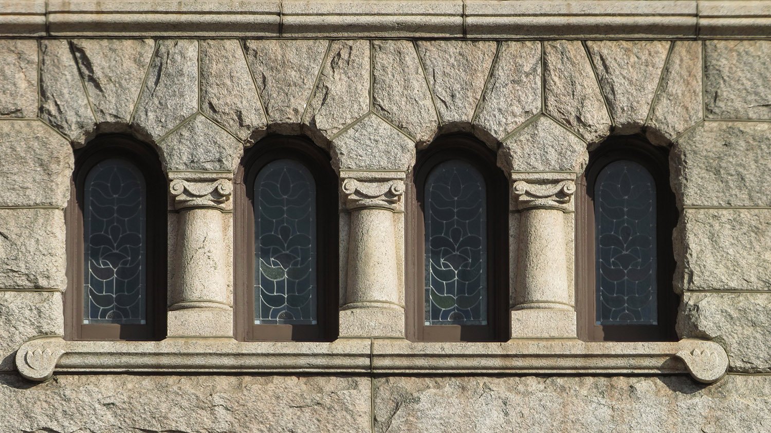 Arch windows and granite block over the entrance of the New Hanover County Courthouse, Wilmington, North Carolina