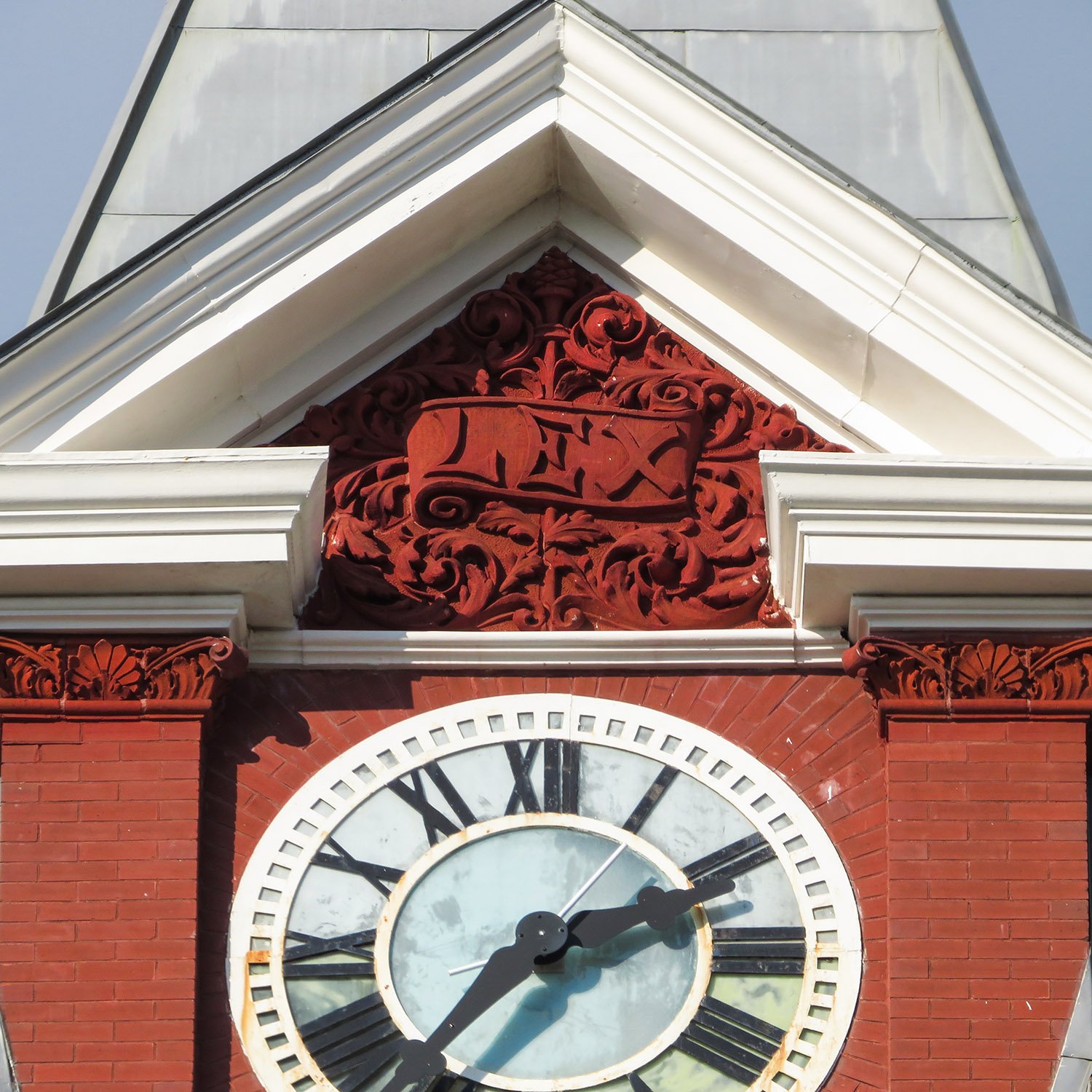 Clock and terracotta ornamentation on the New Hanover County Courthouse, Wilmington, North Carolina