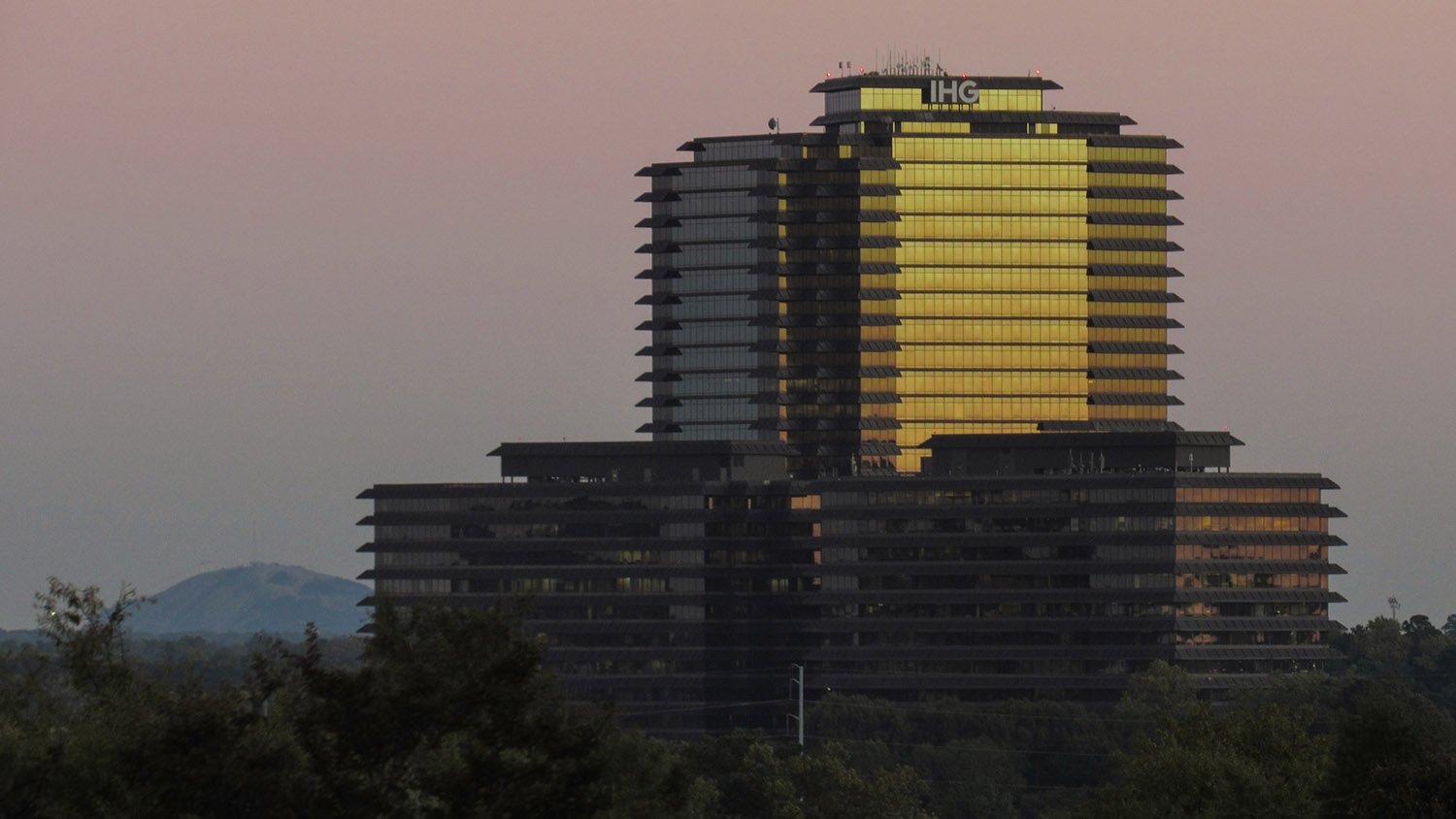 Looking at Three Ravinia Drive from the northwest, with Stone Mountain in the background