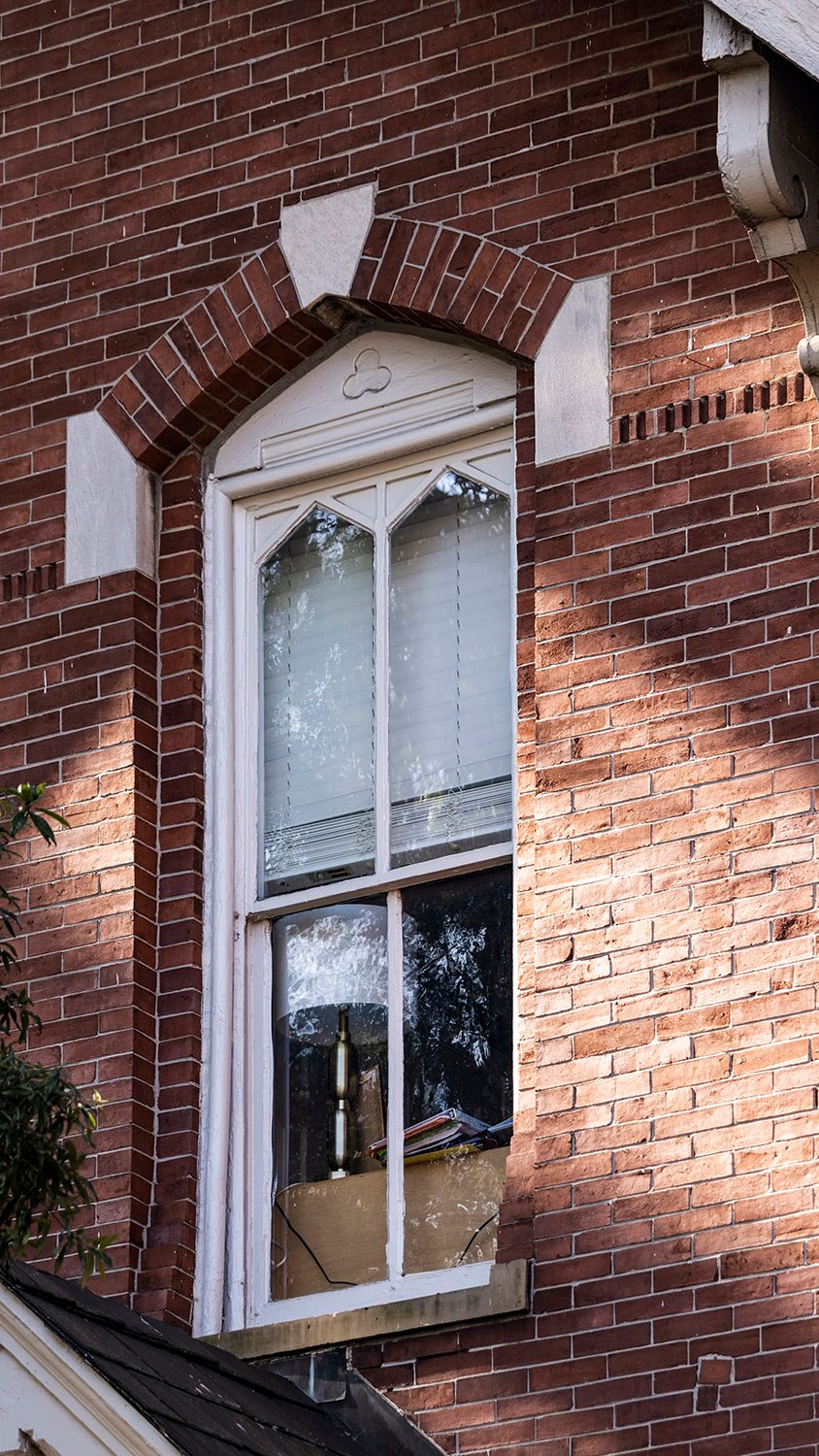 Second-floor window on the facade of The Priest's House