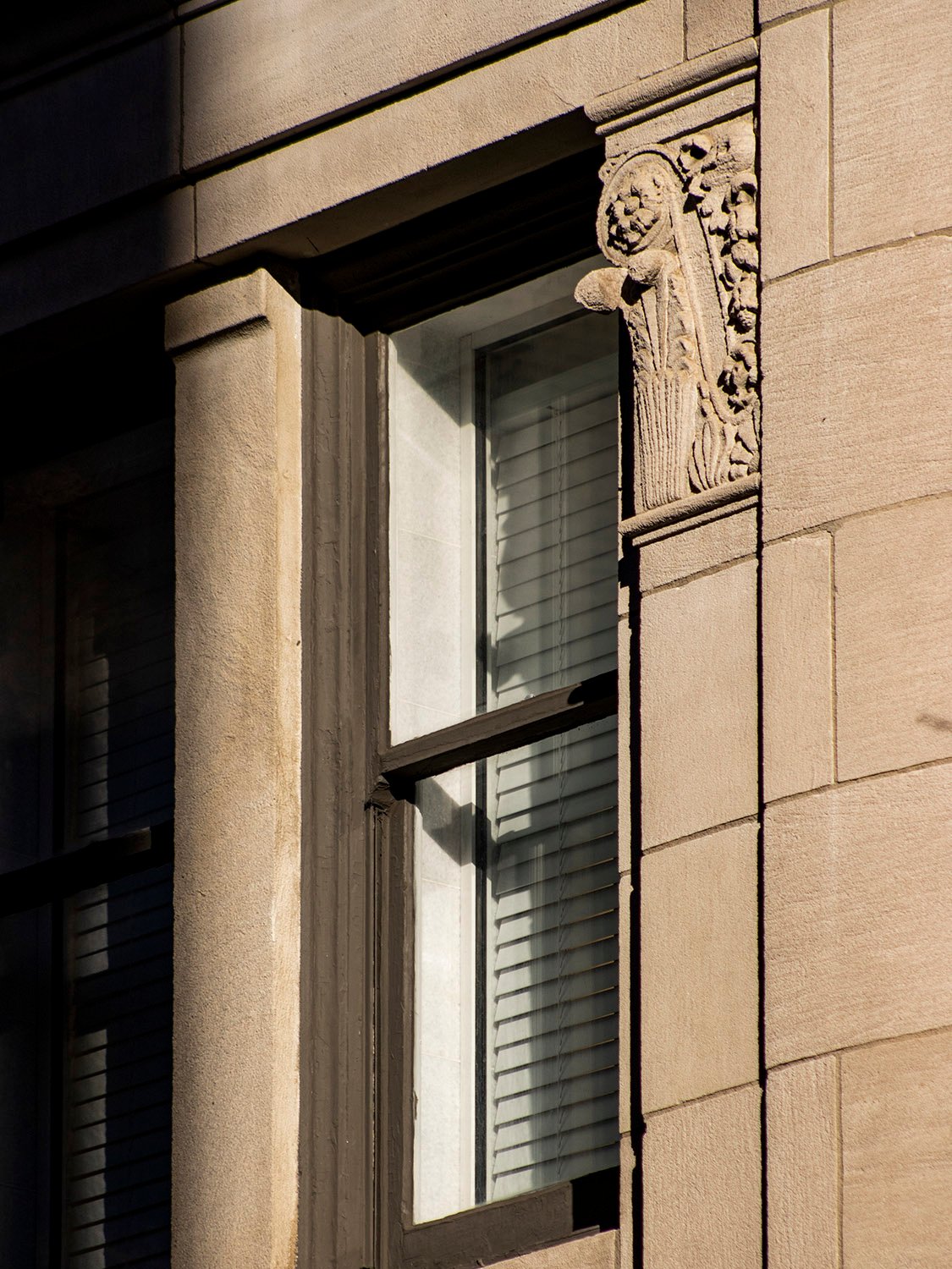 Second-floor window and pilaster capital over the west entrance of the Wynne-Claughton Building, Atlanta