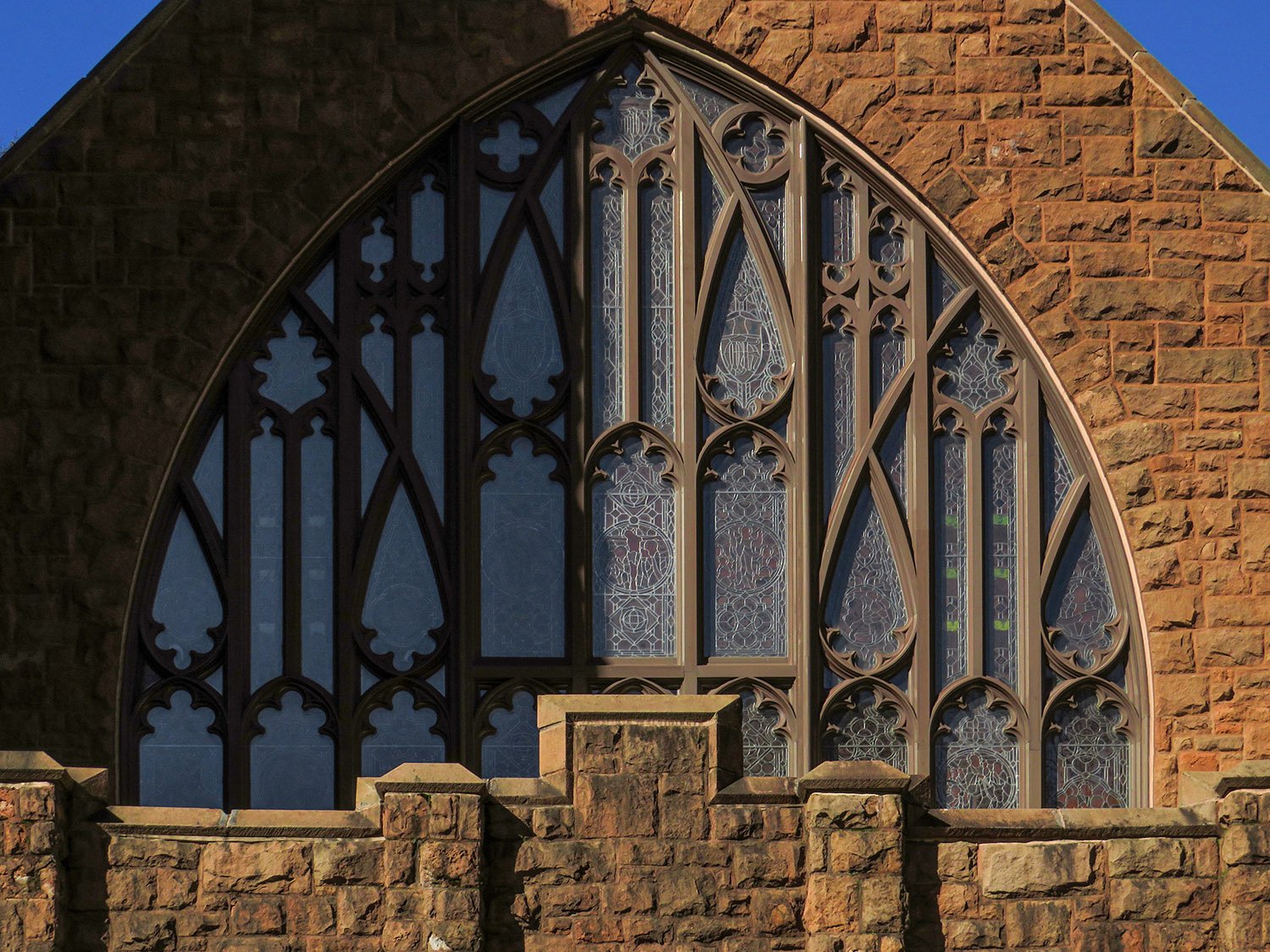 Window and parapet on the facade of All Saints' Episcopal Church, Atlanta
