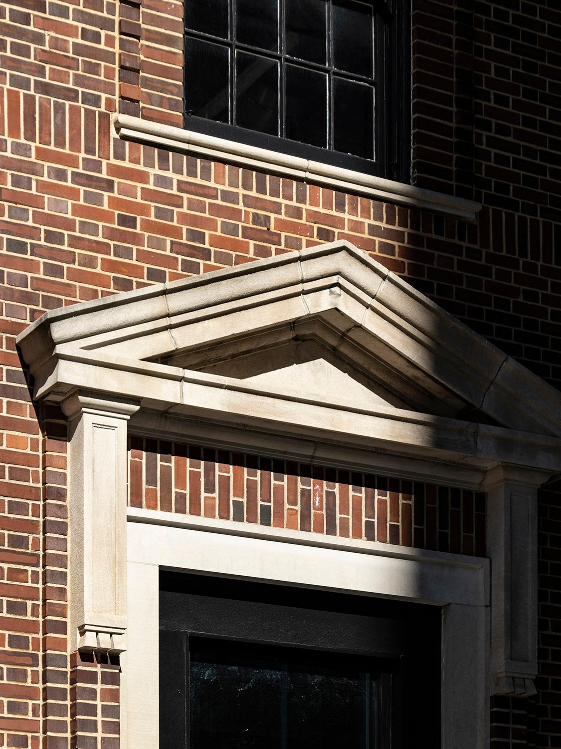 Pediment over a first-floor window on the facade of the Crum & Forster Building, Atlanta