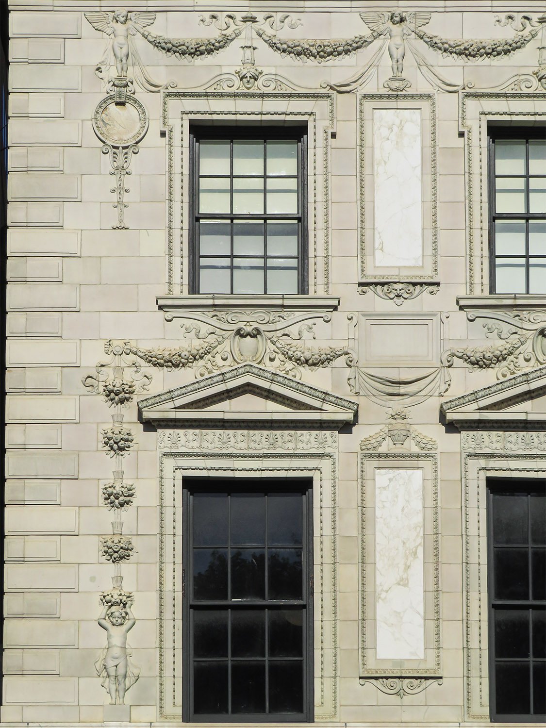 Second- and third-floor windows and ornamentation on the facade of the Robert Wilson Patterson Residence, Washington, D.C. 