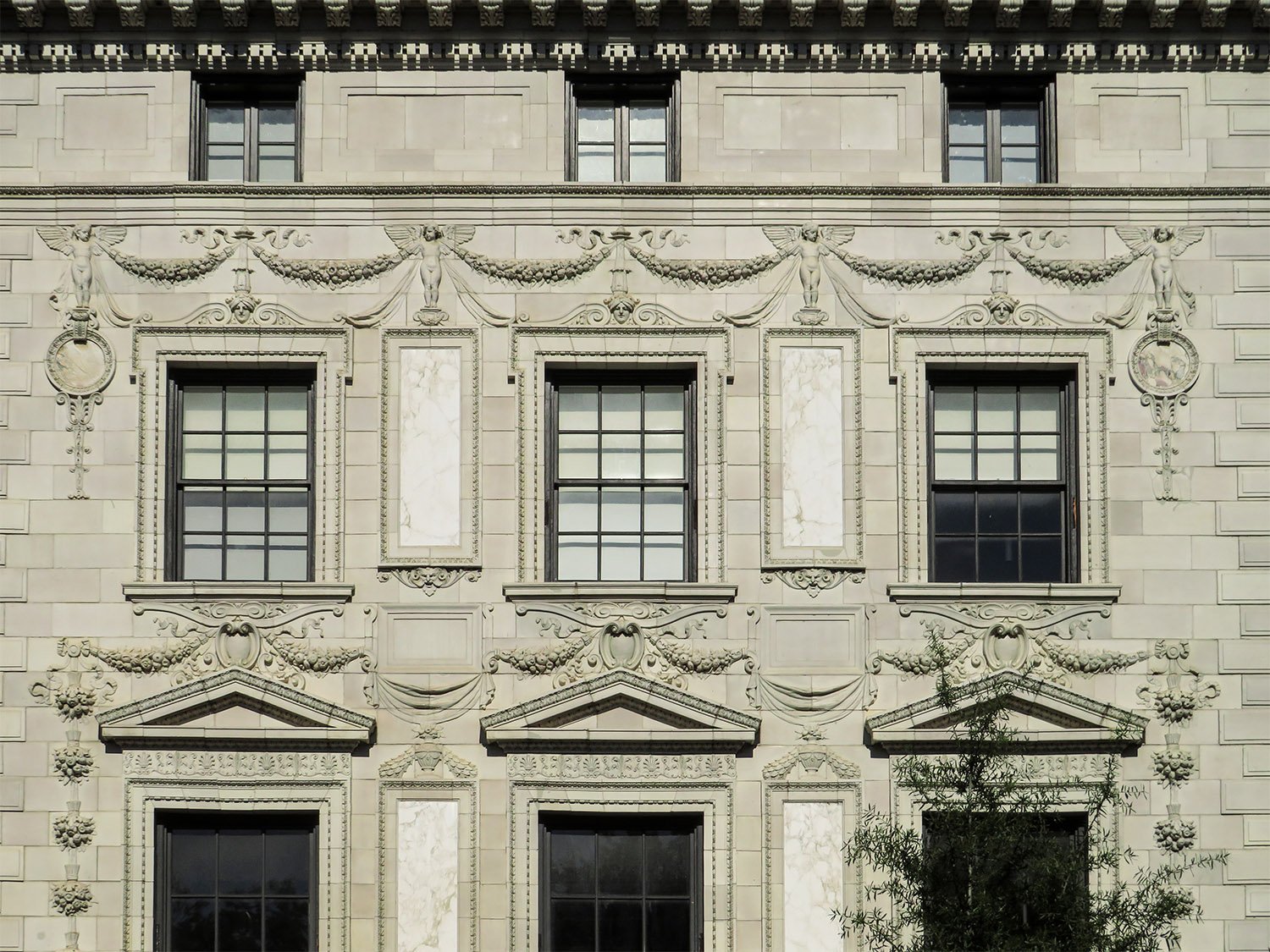 Second, third-floor, and attic windows on the facade of the Robert Wilson Patterson Residence, Washington, D.C. 