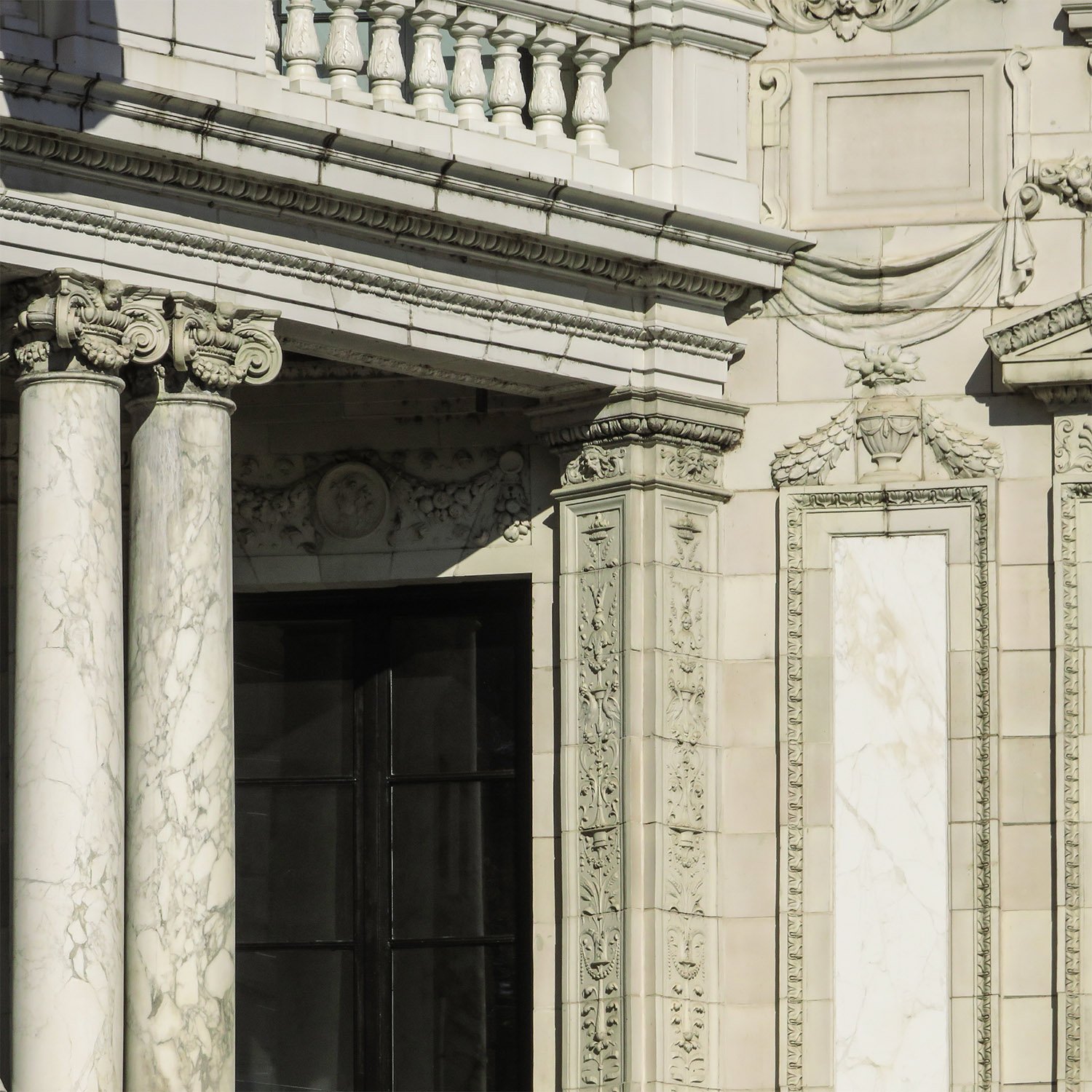 Columns, pilasters, and marble panel on the facade of the Robert Wilson Patterson Residence, Washington, D.C. 