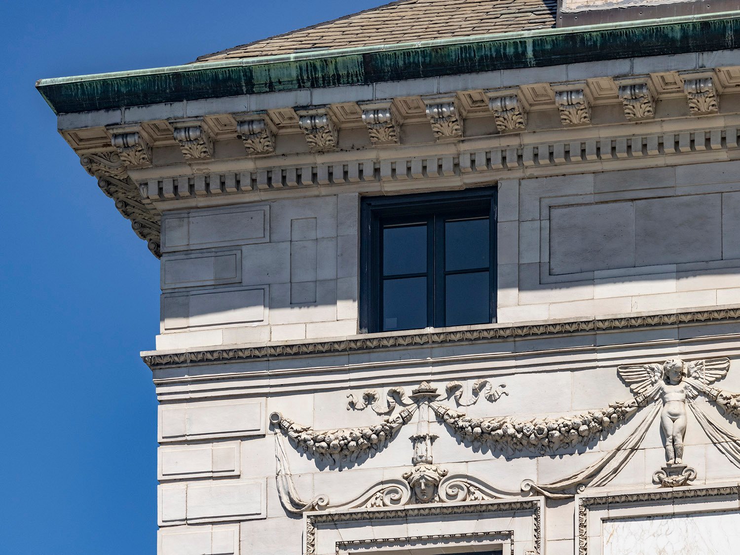 Eaves, cornice, attic window, stringcourse, and ornamentation on the facade of the Robert Wilson Patterson Residence, Washington, D.C. 