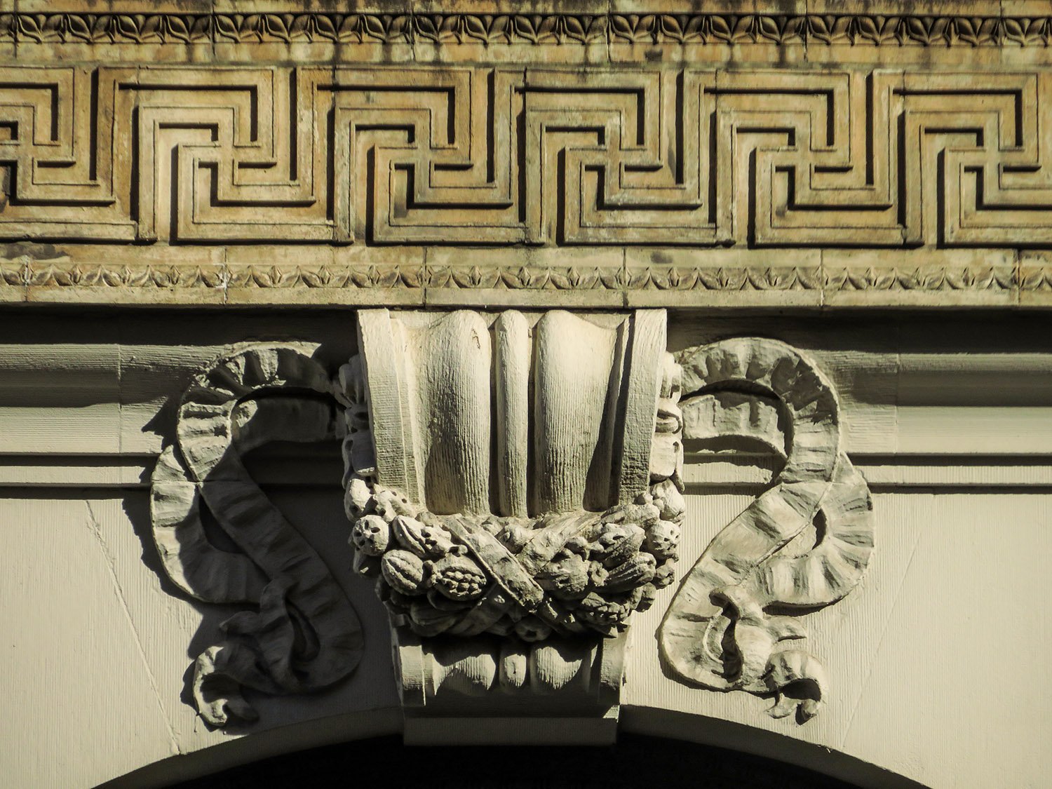 Terra cotta keystone and stringcourse on the Cable Building, New York