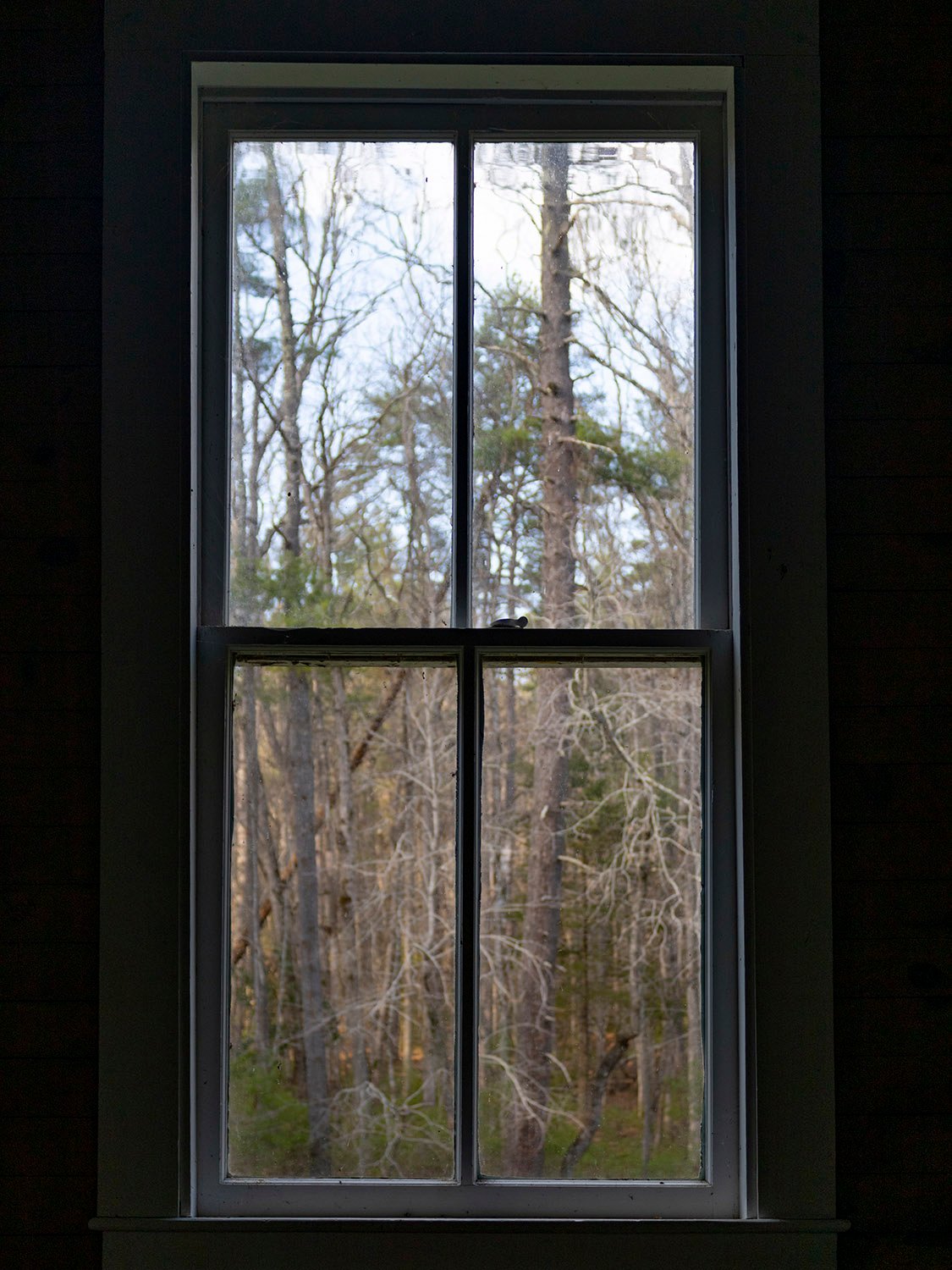 Looking out a window at Cades Cove Missionary Baptist Church. Cades Cove, Tennessee.