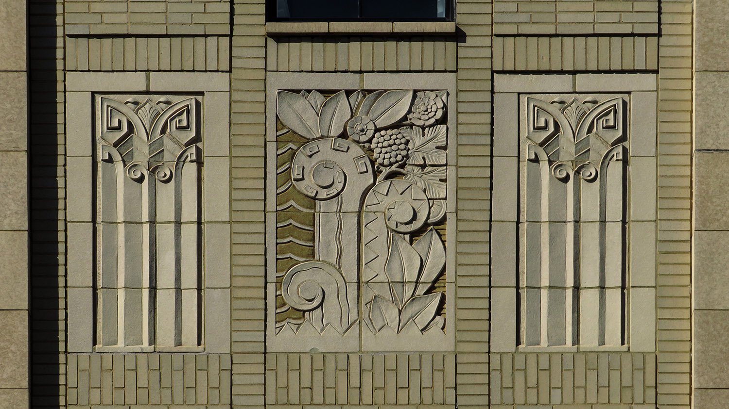 Fourth-floor window on the east facade of S.H. Kress & Co., Durham, North Carolina
