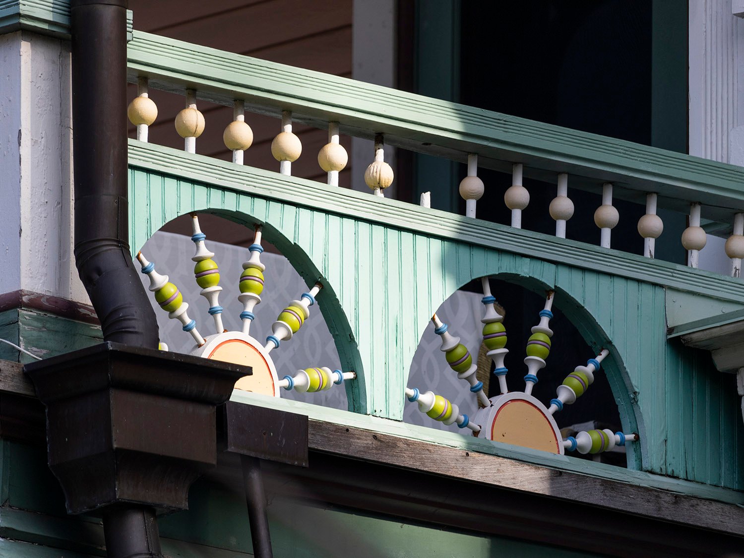 Fretwork rails on the second-floor porch of the George E. King Residence