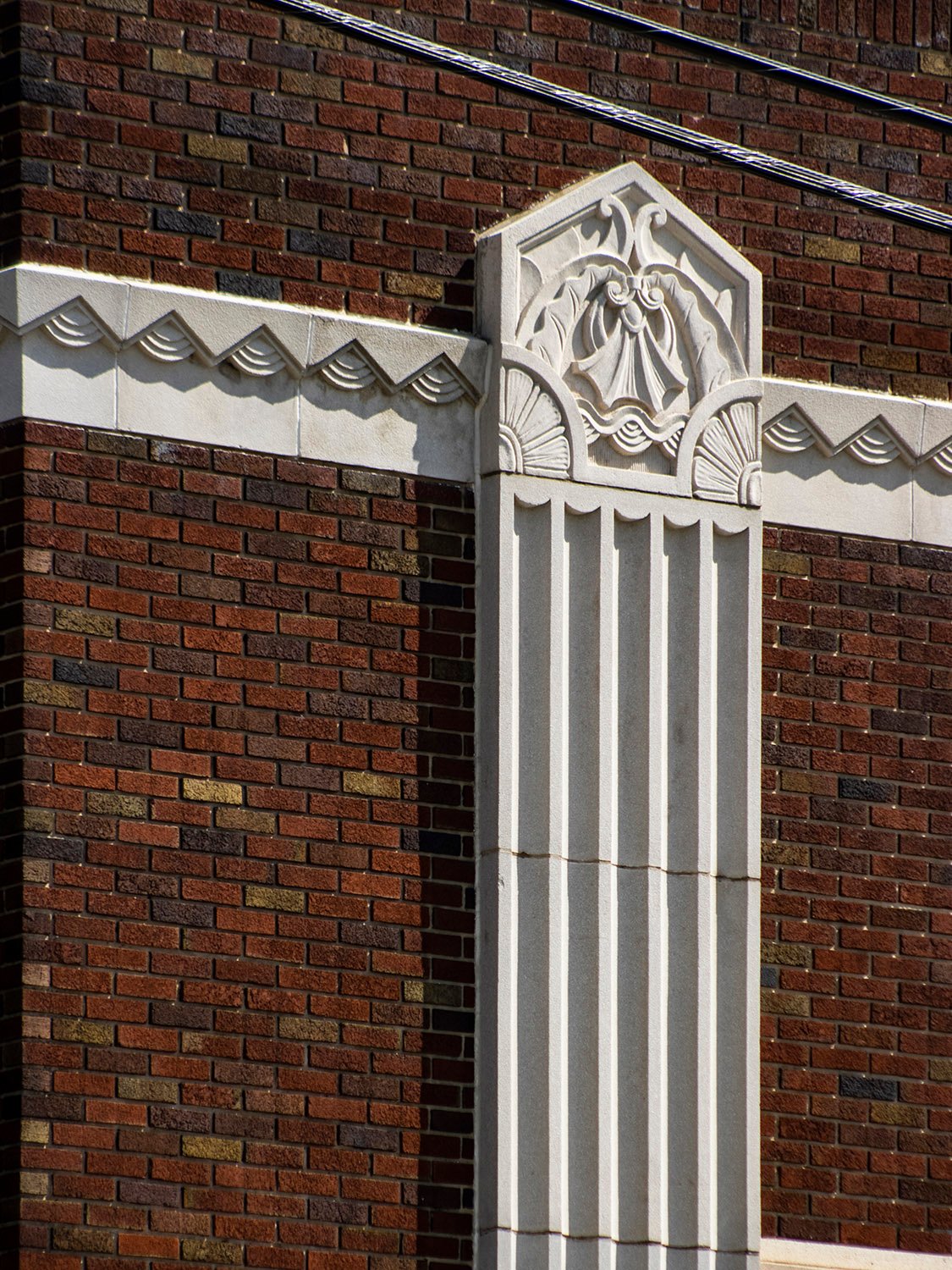 Pilaster and stringcourse on the facade of the Greensboro Coca-Cola Bottling Company, Greensboro, North Carolina