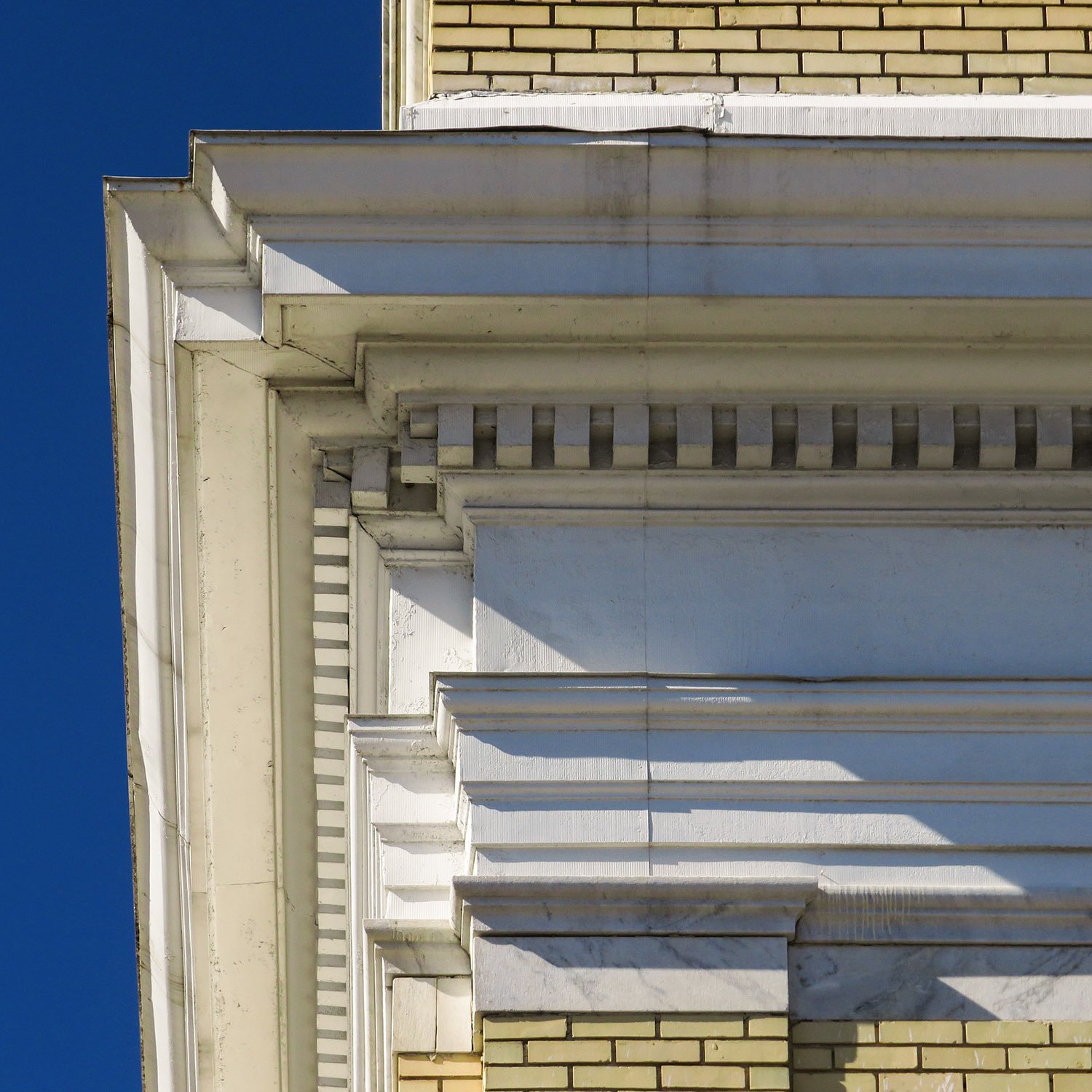 Dentilled cornice on the east facade of the Capitol View Masonic Temple
