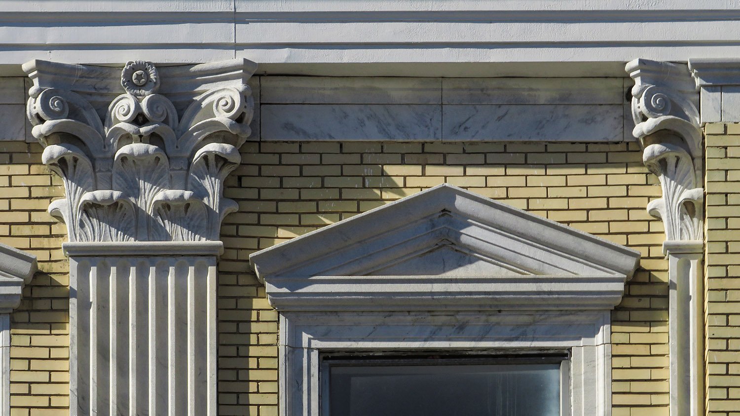 Pilasters with Corinthian capitals on the east facade of the Capitol View Masonic Temple