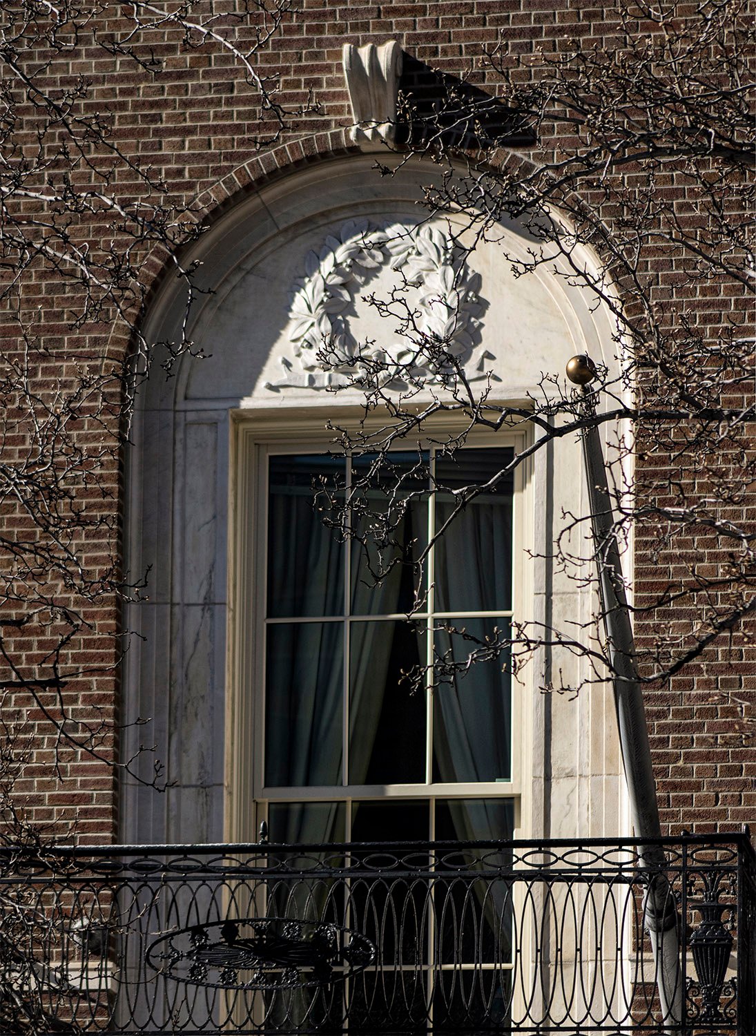 Blind arch window on the east facade of the Percy Pyne Rivington Residence