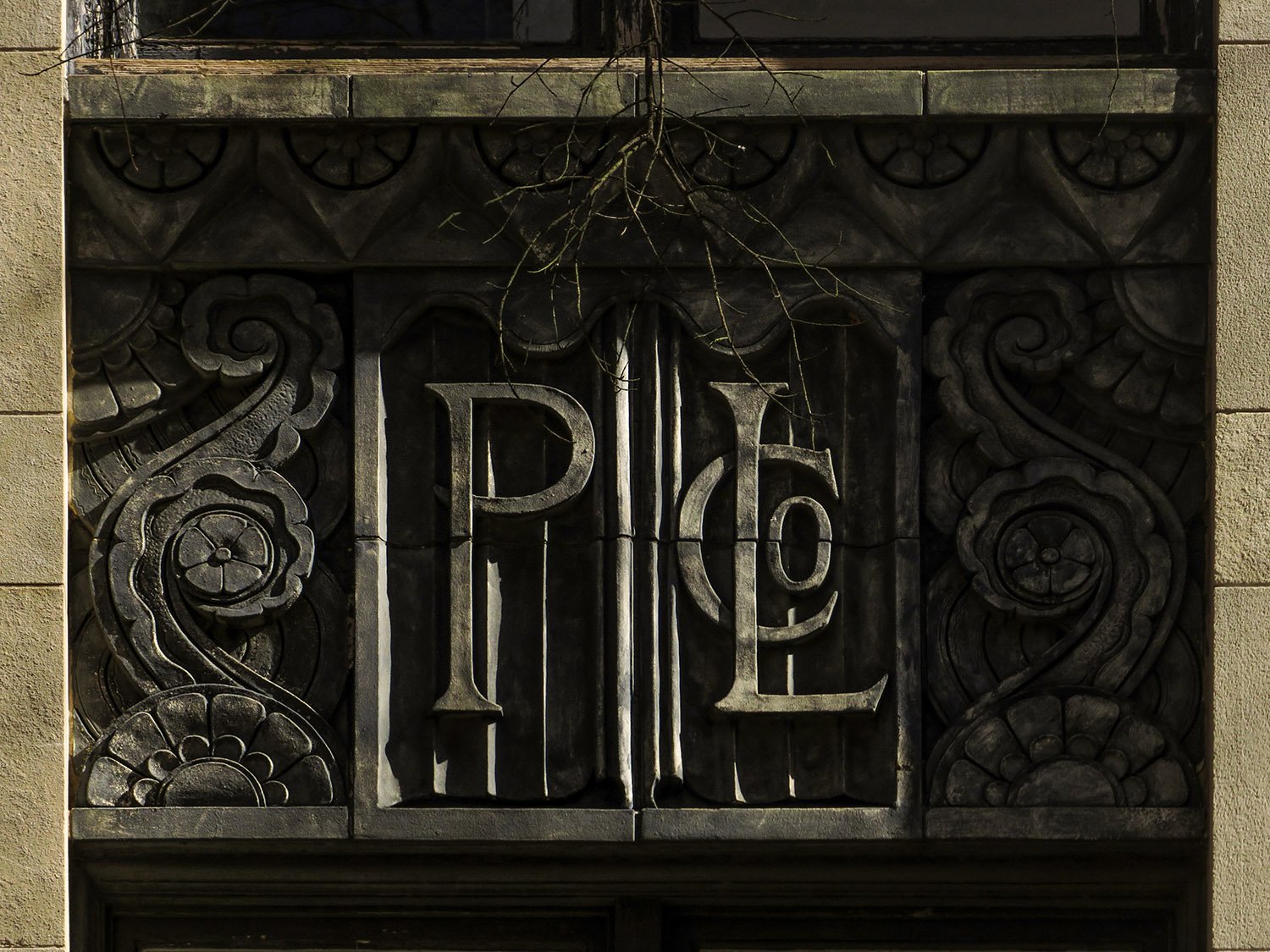 Peters Land Company insignia on the facade of Regenstein's