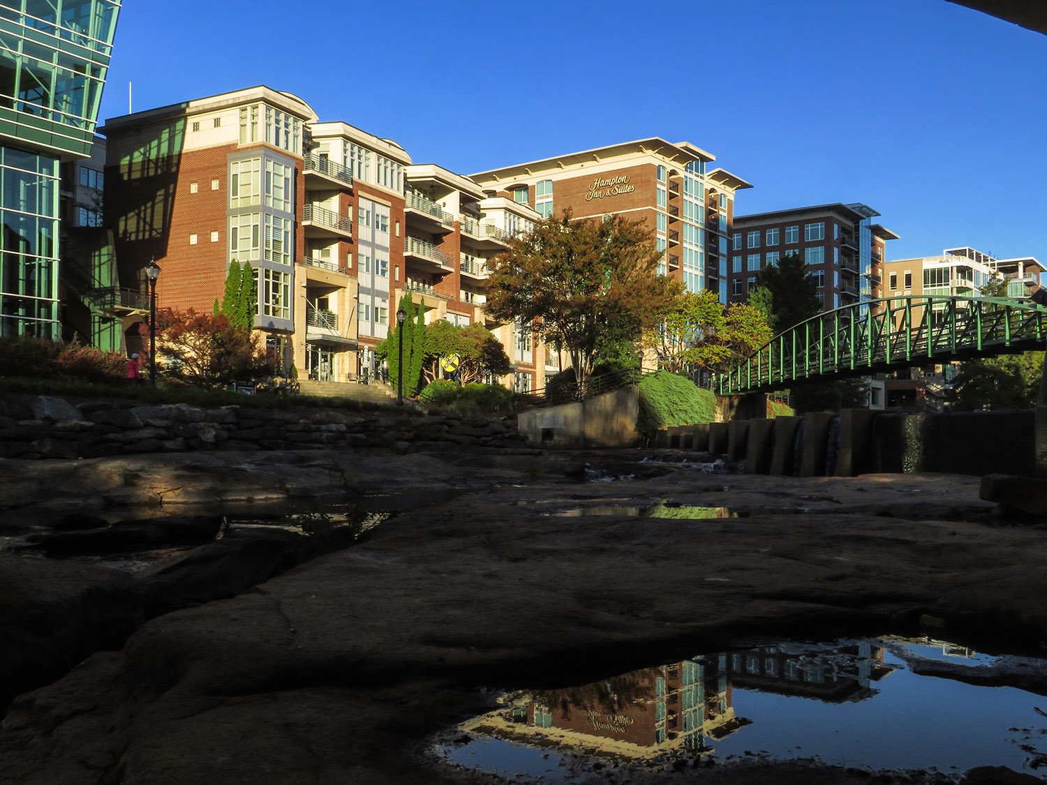 Looking at RiverPlace from the banks of the Reedy River