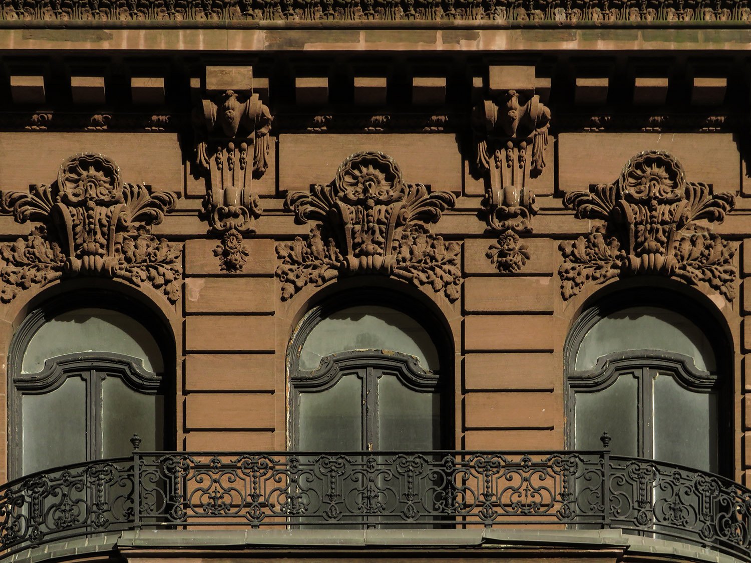 Fifth-floor windows on the Samuel W. Bowne Residence, New York