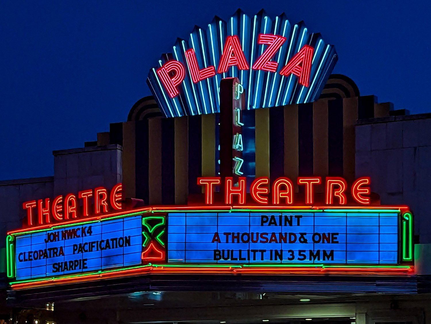 Plaza Theatre marquee at night