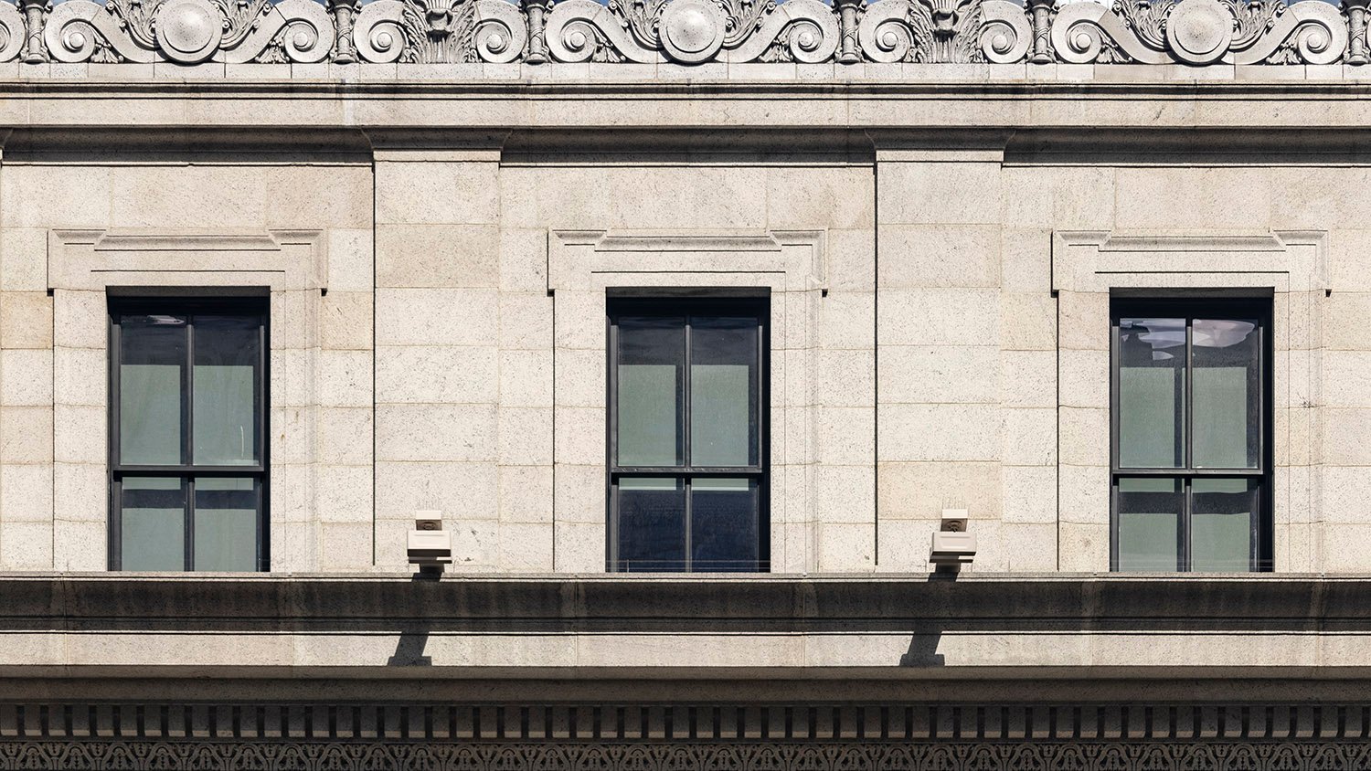 Fifth-floor windows on the facade of the United States Post Office, New York