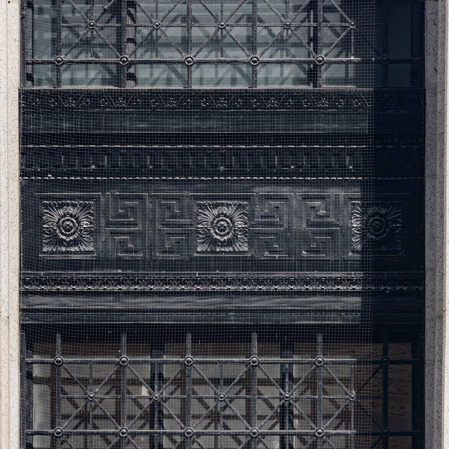 Ornamental iron spandrels on the facade of the United States Post Office, New York