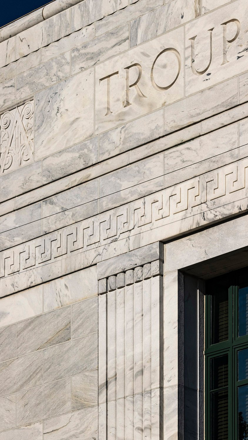 Inscription and etched marble ornamentation on the facade of the Troup County Courthouse, LaGrange, Georgia