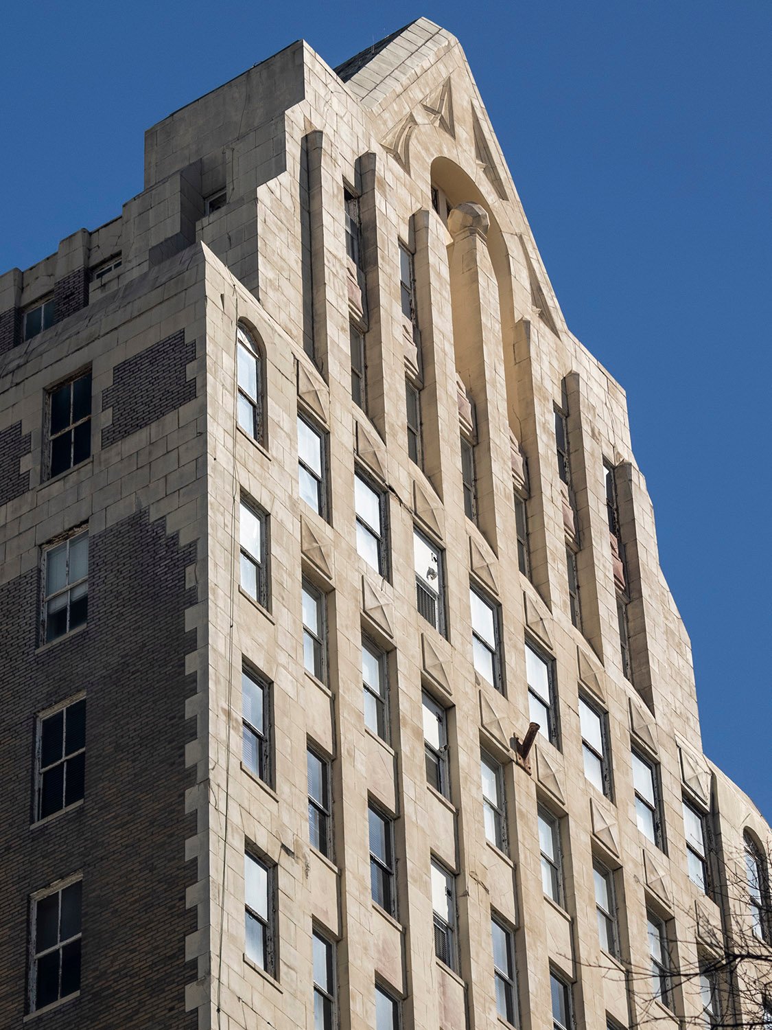 Looking up at the Watts Building from the northwest